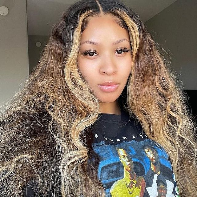 Vee is wearing black tee.